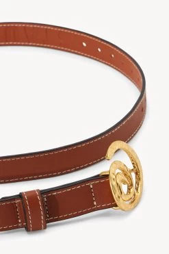 SWIRL BUCKLE BELT | TAN -Staud Outlet Store STAUD SWIRL BUCKLE BELT 25MM TAN HOLIDAY 22 ECOM 2
